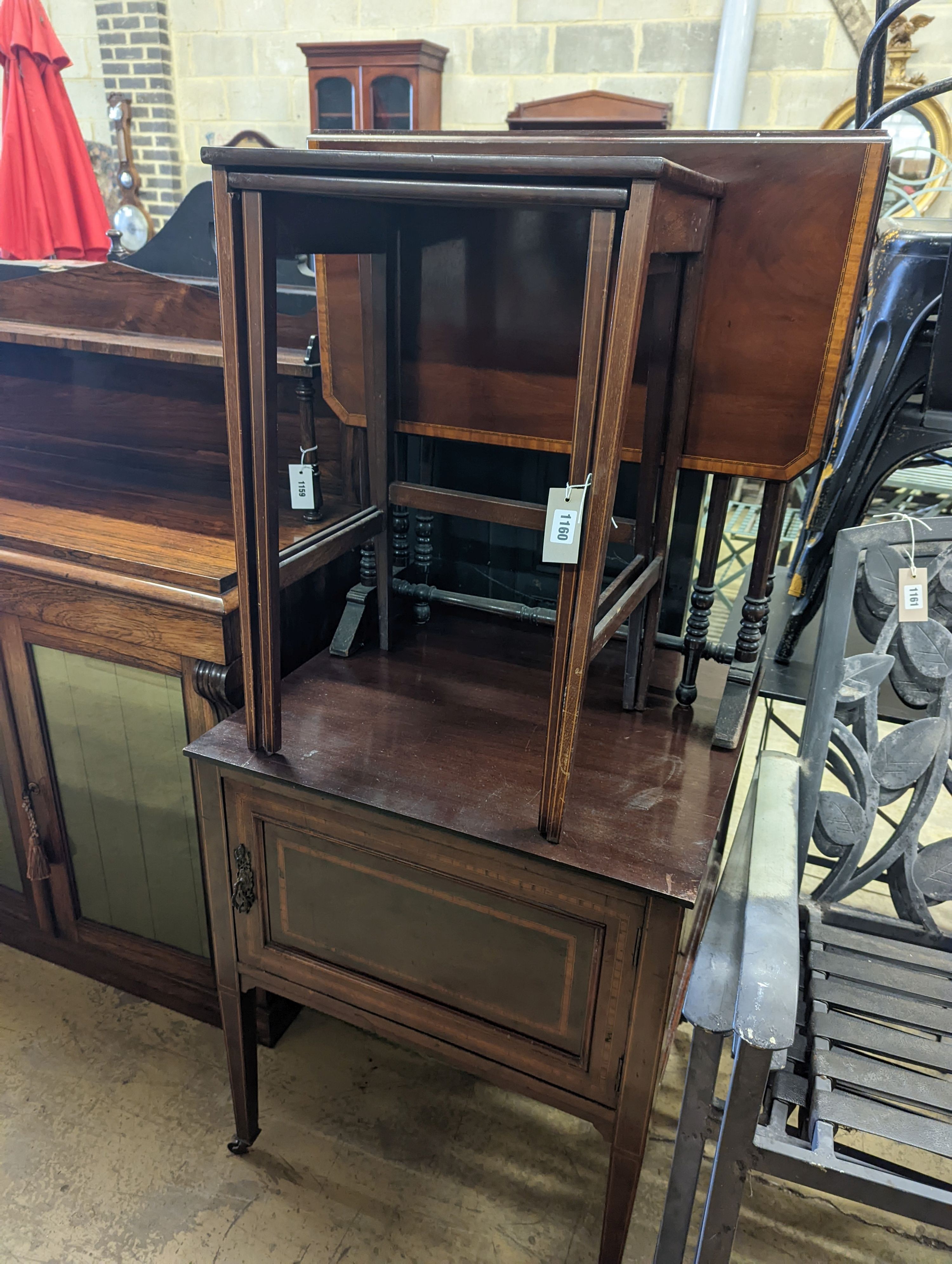 An Edwardian satinwood banded Sutherland table, width 68cm, height 72cm, nest of two tables and a wash stand